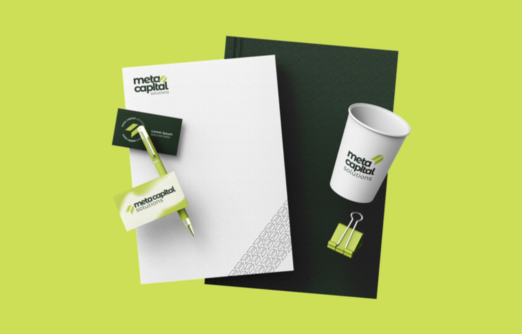 Papelaria da Meta Capital Solutions: papel timbrado, cartões, caderno, copo e caneta